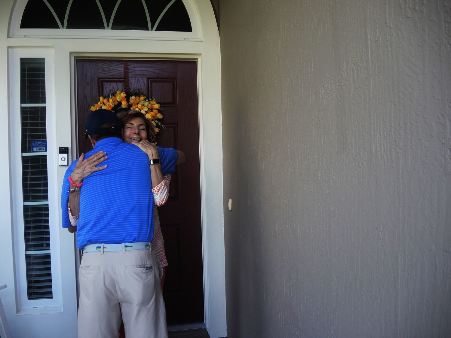 Funk hugs Simpson after he arrives at her house in the bus.